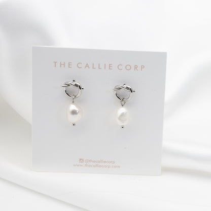 'Bowie' silver freshwater pearl earrings on a clean bridal jewellery background